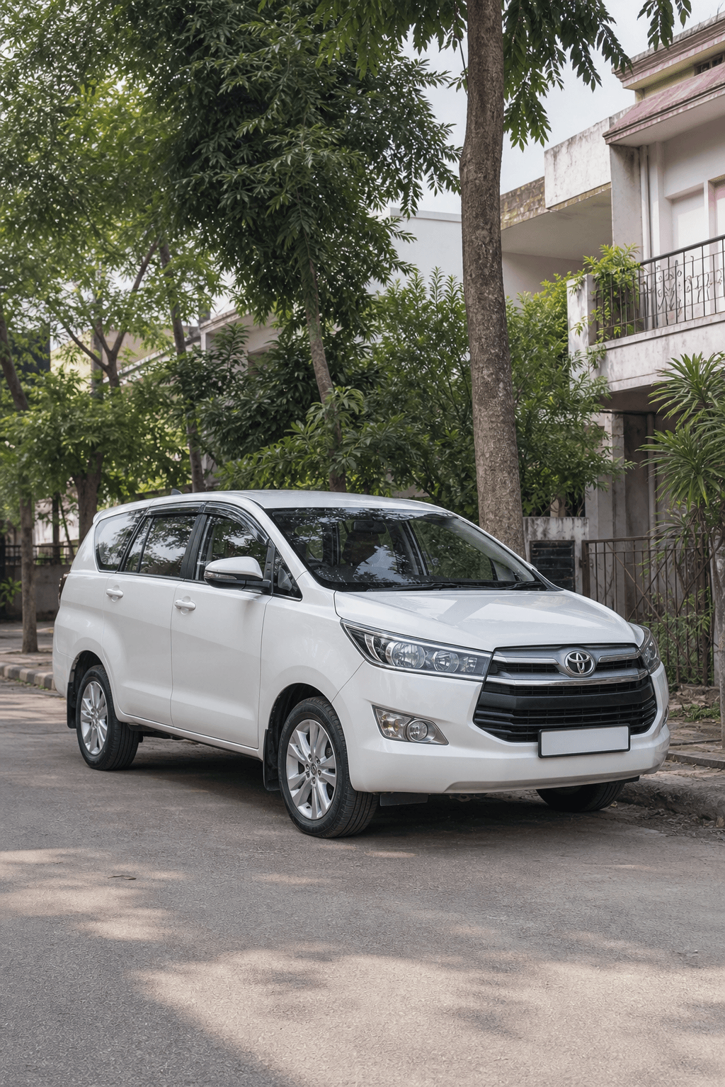 Clean Janta Travels car parked on a quiet residential street